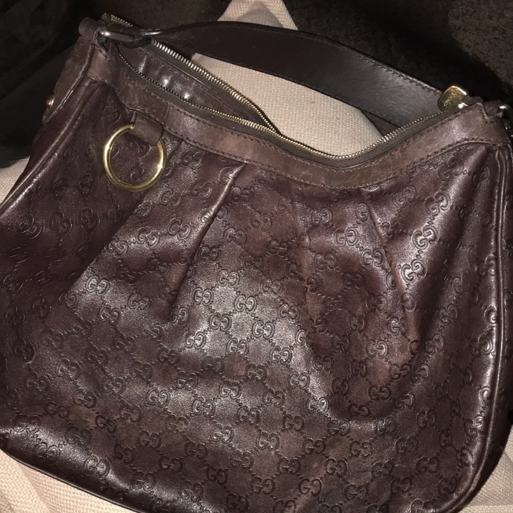 Gucci Purse with matching wallet. Normal wear.